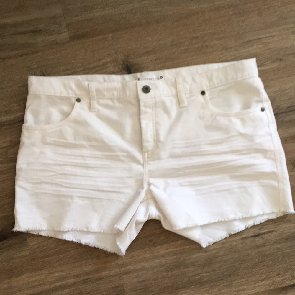 Carve designs. Woman’s size 14. White shorts